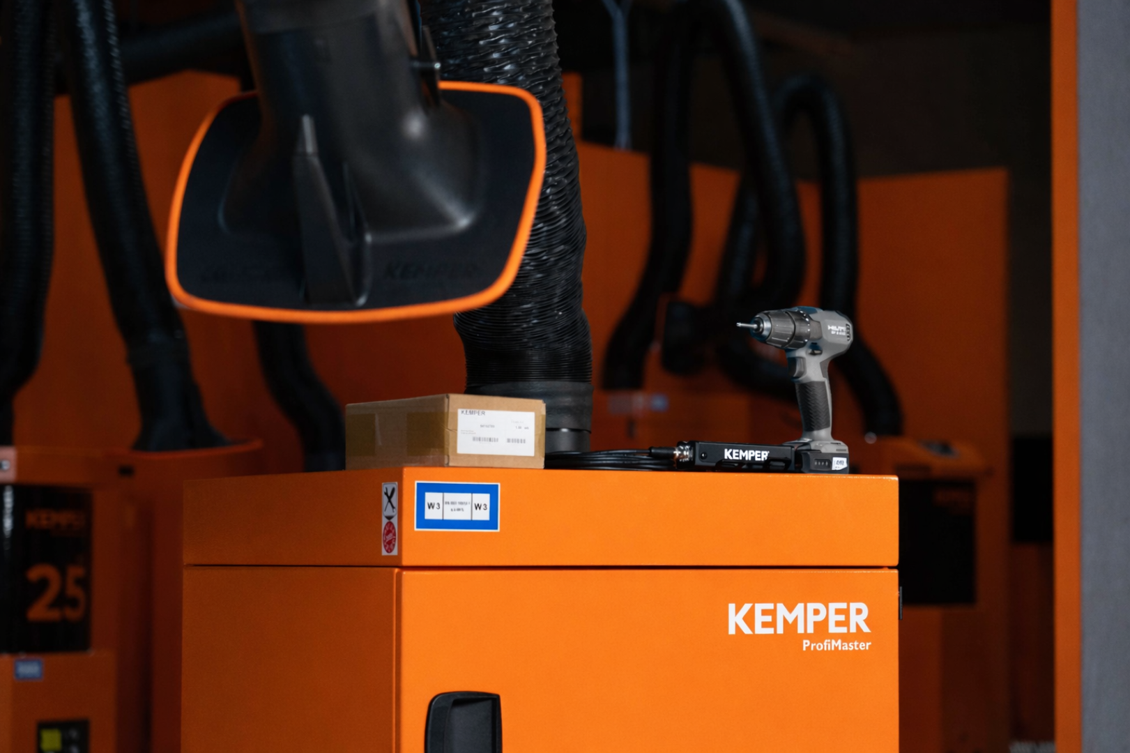 KEMPER ProfiMaster welding fume extraction system with extraction hood, tool and spare part on an industrial filtration unit.
