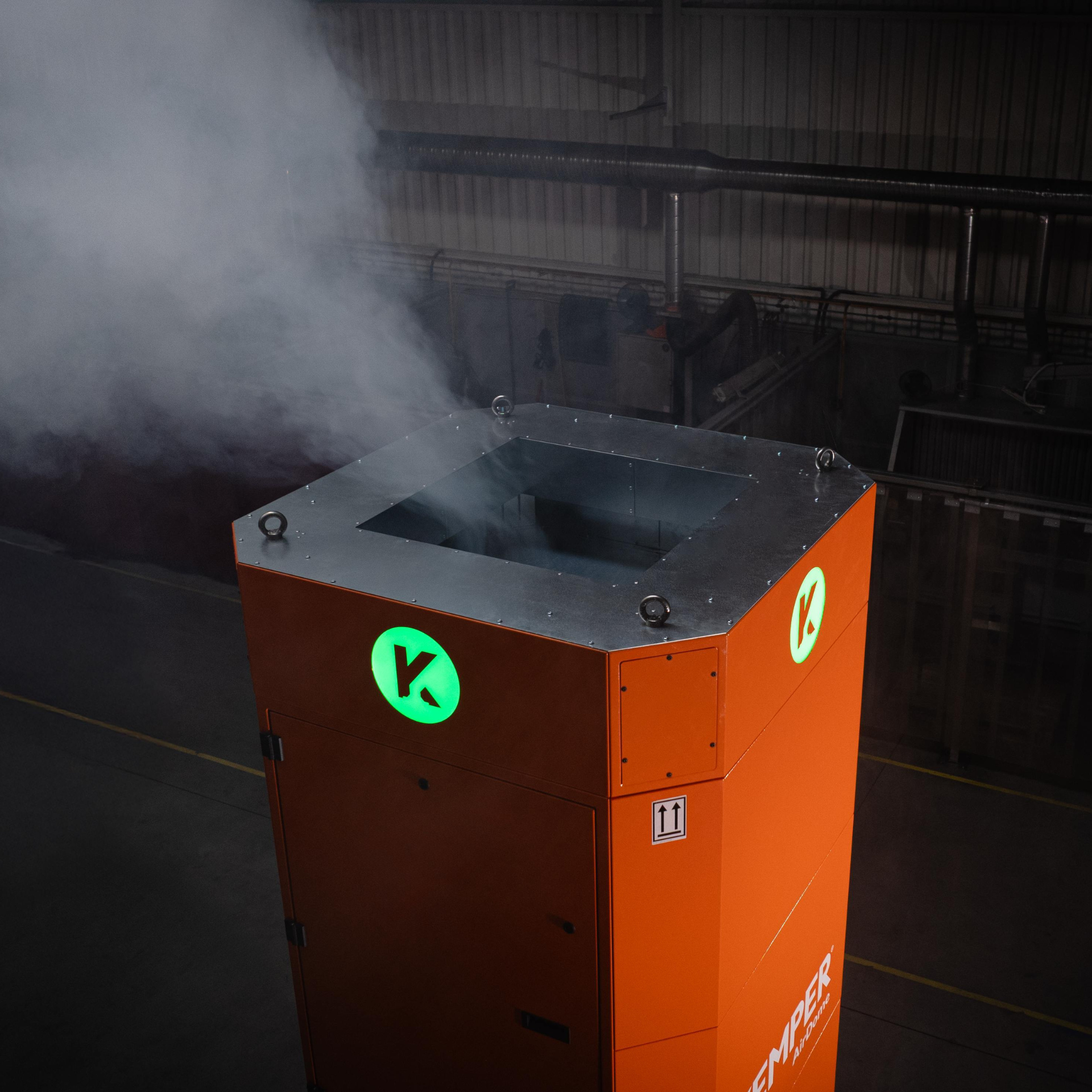 KEMPER extraction and filtration unit removing smoke in an industrial production environment
